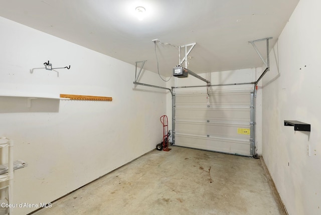 410 Humbird St, Kootenai, ID 83840 - garage featuring a garage door opener
