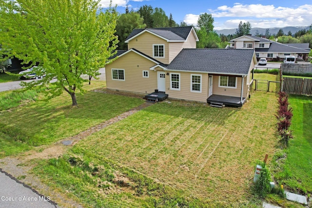 410 Humbird St, Kootenai, ID 83840 - back of property with a deck with mountain view