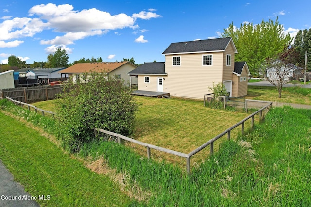 410 Humbird St, Kootenai, ID 83840 - back of property with a wooden deck