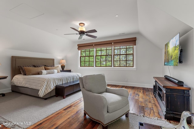 7783 S Buckrail Rd, Harrison, ID 83833 - bedroom with lofted ceiling, wood-type flooring, baseboards, and a ceiling fan