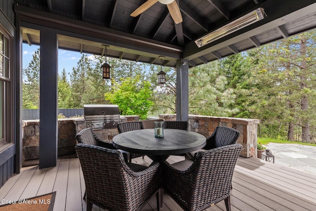 7783 S Buckrail Rd, Harrison, ID 83833 - deck featuring a ceiling fan, area for grilling, and outdoor dining space