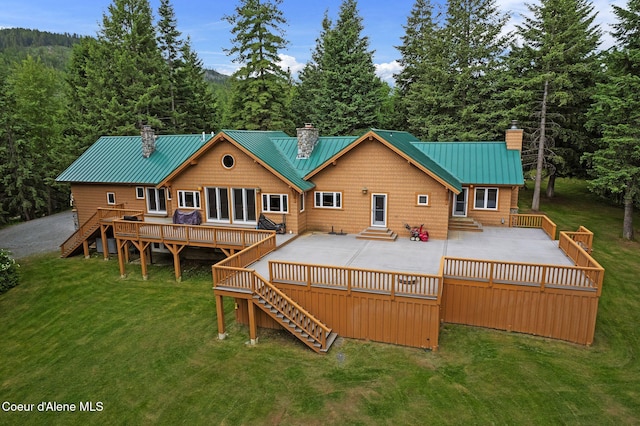 2672 Merril Martin Rd, Sagle, ID 83860 - back of property featuring a chimney, stairway, and entry steps