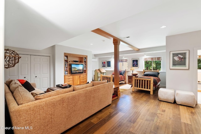 2672 Merril Martin Rd, Sagle, ID 83860 - living area featuring wood finished floors, ornate columns, and recessed lighting