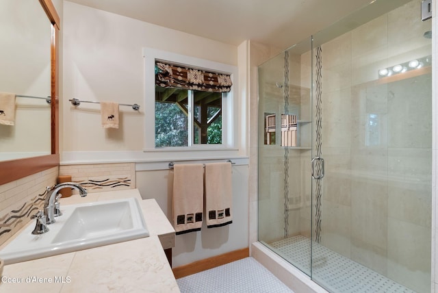 2672 Merril Martin Rd, Sagle, ID 83860 - bathroom with a shower stall, vanity, and tasteful backsplash
