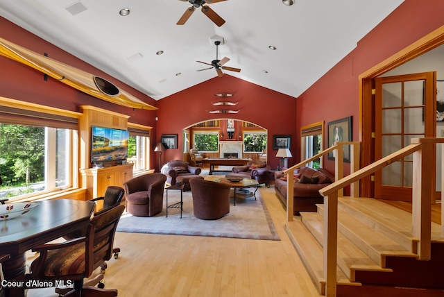 2672 Merril Martin Rd, Sagle, ID 83860 - living area with wood finished floors, a ceiling fan, lofted ceiling, recessed lighting, and stairway