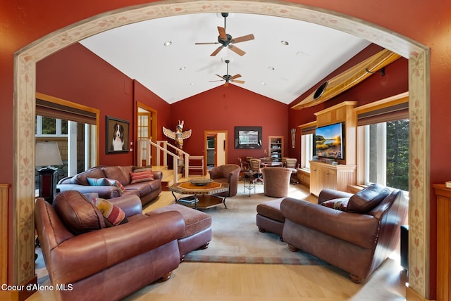 2672 Merril Martin Rd, Sagle, ID 83860 - living room with healthy amount of natural light, vaulted ceiling, a ceiling fan, and arched walkways