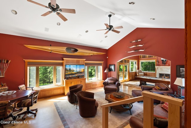 2672 Merril Martin Rd, Sagle, ID 83860 - living area with lofted ceiling, a ceiling fan, a high end fireplace, healthy amount of natural light, and recessed lighting