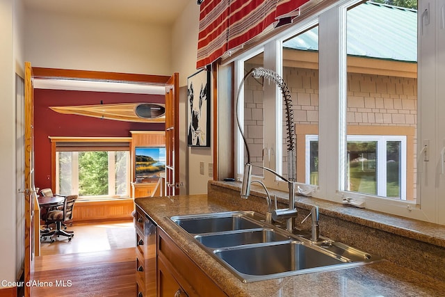 2672 Merril Martin Rd, Sagle, ID 83860 - kitchen with wood finished floors, dark countertops, and an office area