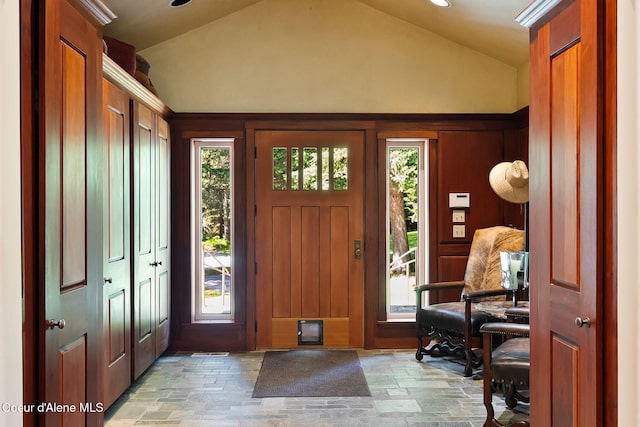 2672 Merril Martin Rd, Sagle, ID 83860 - foyer entrance with light stone finish flooring, lofted ceiling, and plenty of natural light