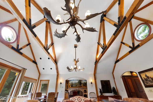 2672 Merril Martin Rd, Sagle, ID 83860 - living area featuring a high ceiling, a chandelier, and arched walkways
