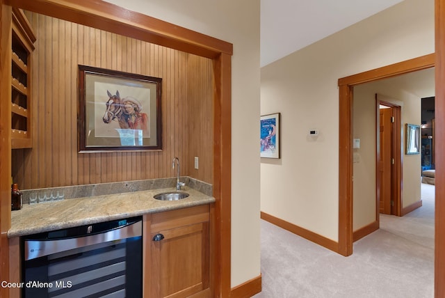 2672 Merril Martin Rd, Sagle, ID 83860 - indoor wet bar featuring beverage cooler and light colored carpet