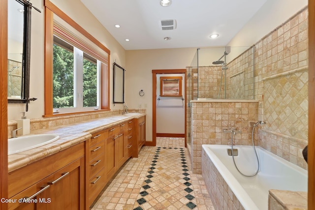 2672 Merril Martin Rd, Sagle, ID 83860 - full bathroom with a stall shower, double vanity, a bath, and recessed lighting