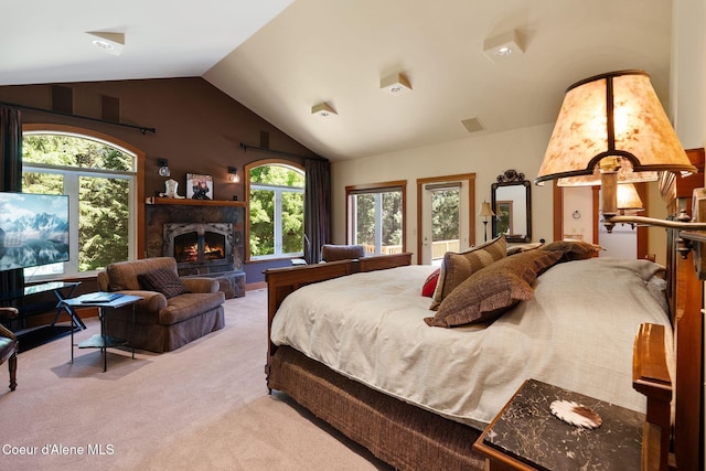 2672 Merril Martin Rd, Sagle, ID 83860 - carpeted bedroom featuring a fireplace and lofted ceiling