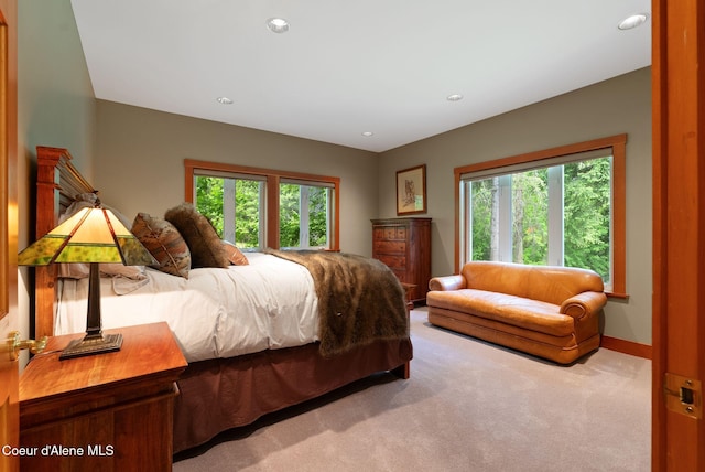2672 Merril Martin Rd, Sagle, ID 83860 - bedroom featuring multiple windows, carpet floors, and recessed lighting