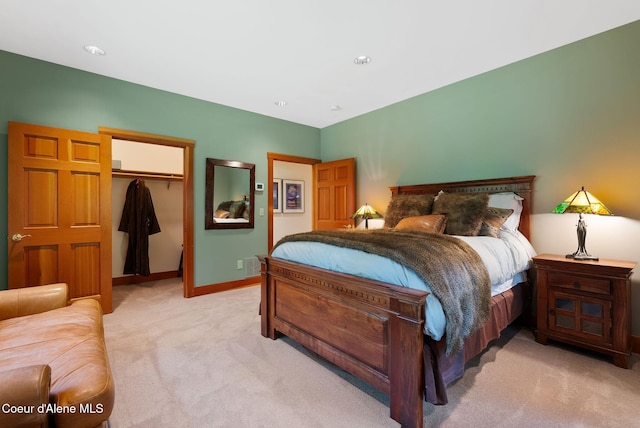 2672 Merril Martin Rd, Sagle, ID 83860 - carpeted bedroom with a walk in closet and baseboards