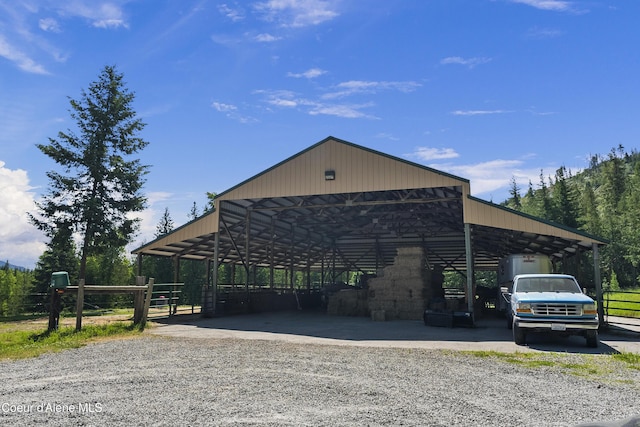 2672 Merril Martin Rd, Sagle, ID 83860 - view of front of house with gravel driveway and a detached carport