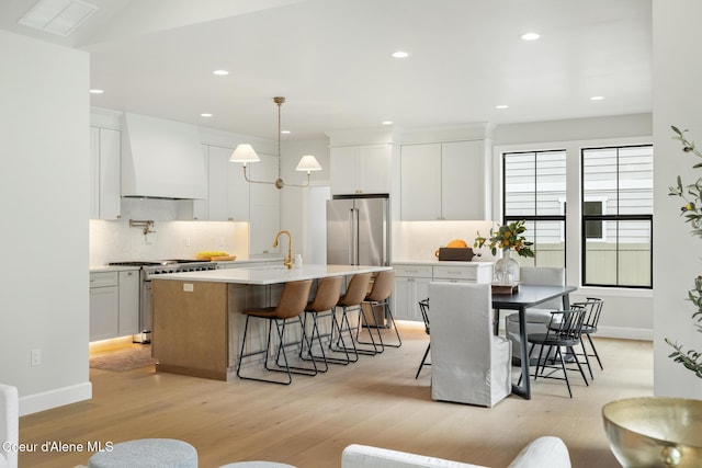 11947 N Rocking R Rd, Hayden, ID 83835 - dining space featuring recessed lighting, light wood-type flooring, and baseboards
