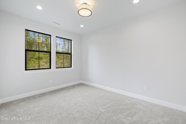 11947 N Rocking R Rd, Hayden, ID 83835 - carpeted spare room featuring baseboards and recessed lighting