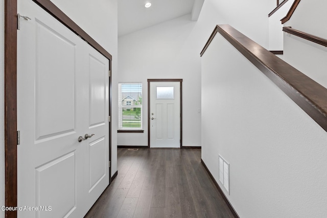 4463 E Marble Fox Ave, Post Falls, ID 83854 - hallway featuring dark wood-style floors, high vaulted ceiling, baseboards, and recessed lighting