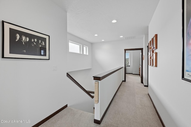 4463 E Marble Fox Ave, Post Falls, ID 83854 - corridor with an upstairs landing, light colored carpet, recessed lighting, and baseboards