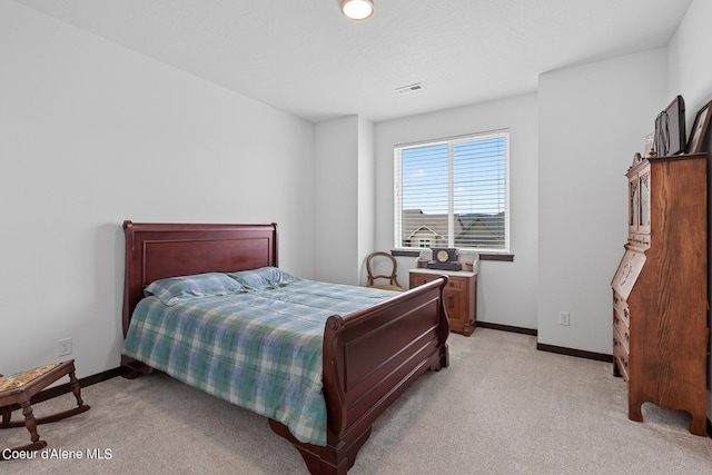 4463 E Marble Fox Ave, Post Falls, ID 83854 - bedroom with light carpet and baseboards