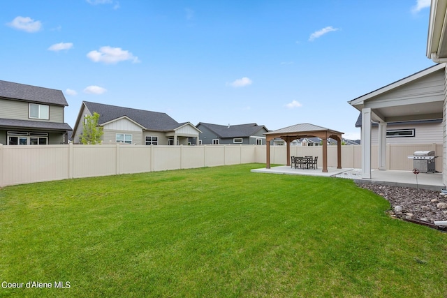 4463 E Marble Fox Ave, Post Falls, ID 83854 - view of yard featuring a patio area, a gazebo, and a residential view