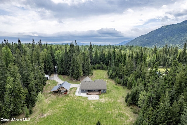 193 Grouse Rd, Sandpoint, ID 83864 - aerial view of property and surrounding area with a forest and a mountain backdrop