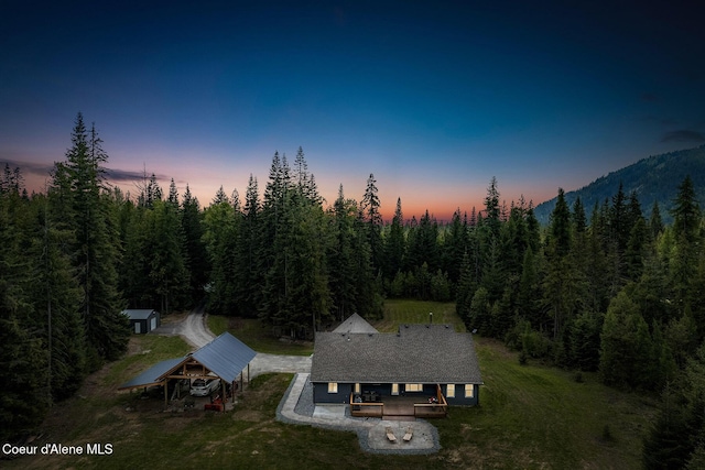 193 Grouse Rd, Sandpoint, ID 83864 - view of subject property with a heavily wooded area