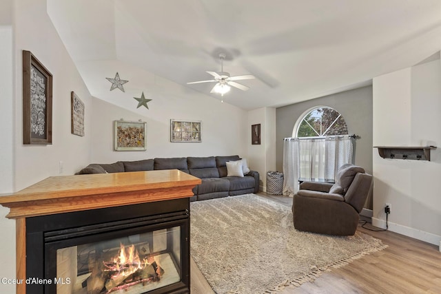 821 W Mustang Ave, Hayden, ID 83835 - living room featuring wood finished floors, ceiling fan, lofted ceiling, and baseboards