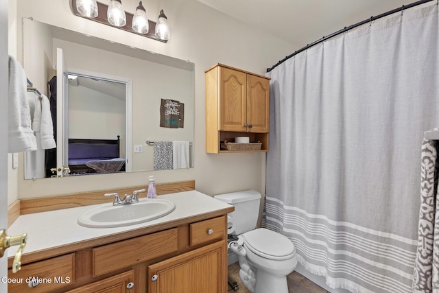 821 W Mustang Ave, Hayden, ID 83835 - ensuite bathroom featuring toilet and vanity
