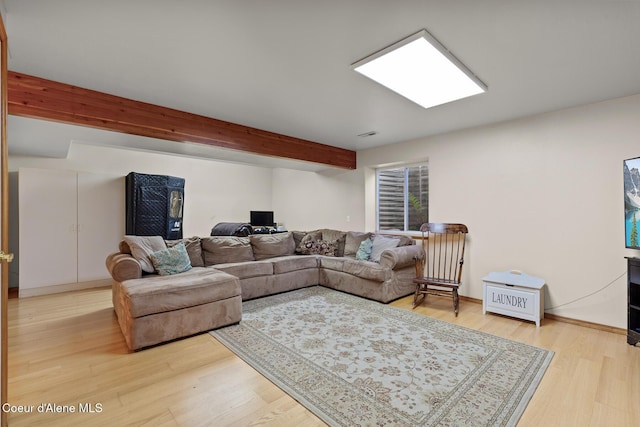821 W Mustang Ave, Hayden, ID 83835 - living area with beamed ceiling and light wood finished floors