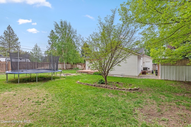 821 W Mustang Ave, Hayden, ID 83835 - view of yard with a trampoline