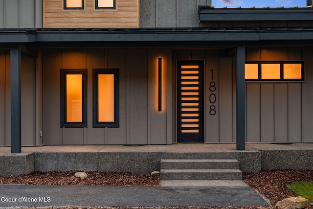 1808 Garfield Bay Rd, Sagle, ID 83860 - entrance to property featuring a porch and board and batten siding