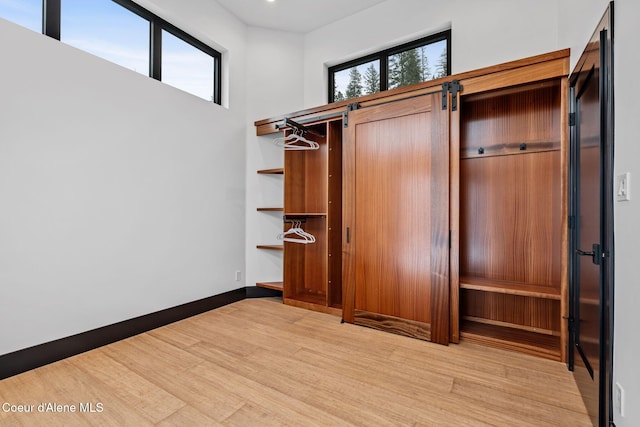 1808 Garfield Bay Rd, Sagle, ID 83860 - walk in closet with light wood finished floors