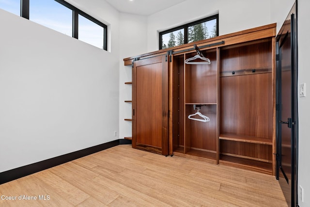 1808 Garfield Bay Rd, Sagle, ID 83860 - walk in closet with wood finished floors