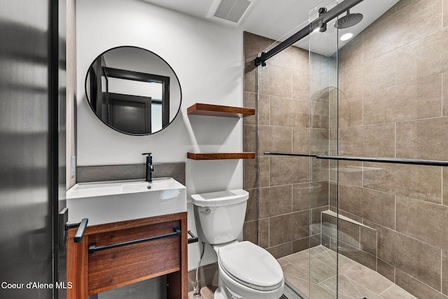 1808 Garfield Bay Rd, Sagle, ID 83860 - full bath featuring a tile shower, toilet, and vanity