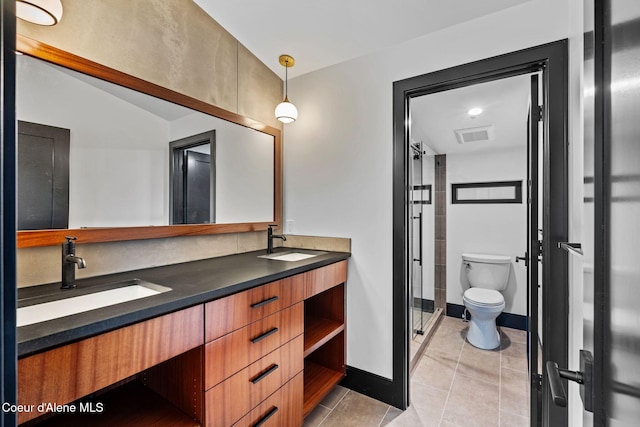 1808 Garfield Bay Rd, Sagle, ID 83860 - bathroom featuring toilet, tile patterned floors, double vanity, and a shower stall