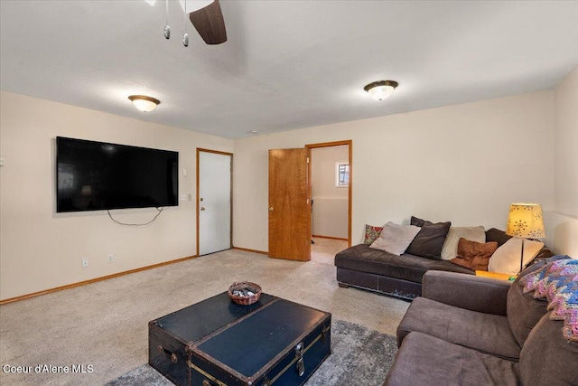 2101 W Bordeaux Ave, Hayden, ID 83835 - carpeted living room with baseboards and a ceiling fan