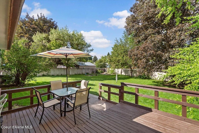 2101 W Bordeaux Ave, Hayden, ID 83835 - wooden deck with outdoor dining area
