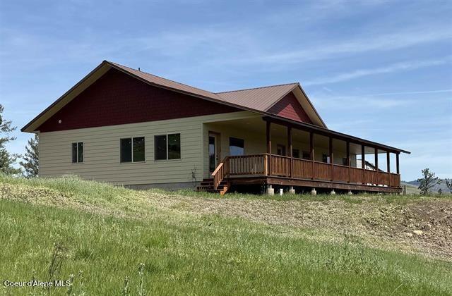 240 Canyon Dr, Kooskia, ID 83539 - rear view of property with a porch