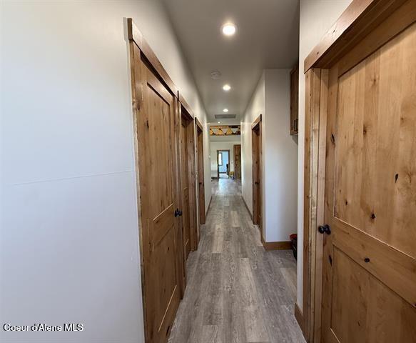 240 Canyon Dr, Kooskia, ID 83539 - corridor featuring wood finished floors and recessed lighting