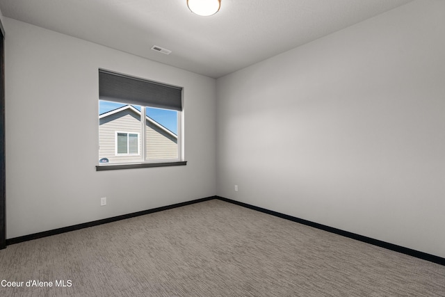 6568 N Downing Ln, Coeur Dalene, ID 83815 - carpeted spare room with baseboards