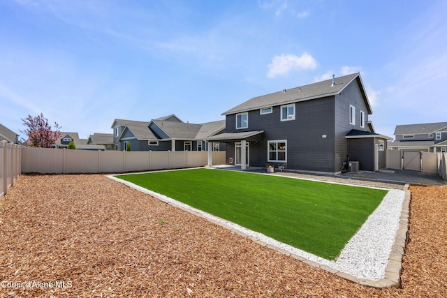 6568 N Downing Ln, Coeur Dalene, ID 83815 - back of house with a patio area, a gate, and central air condition unit