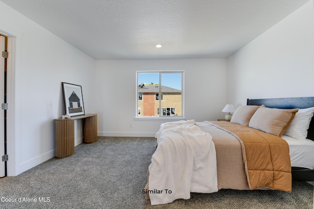 701 N Creative Way, Post Falls, ID 83854 - bedroom with baseboards, carpet floors, and recessed lighting