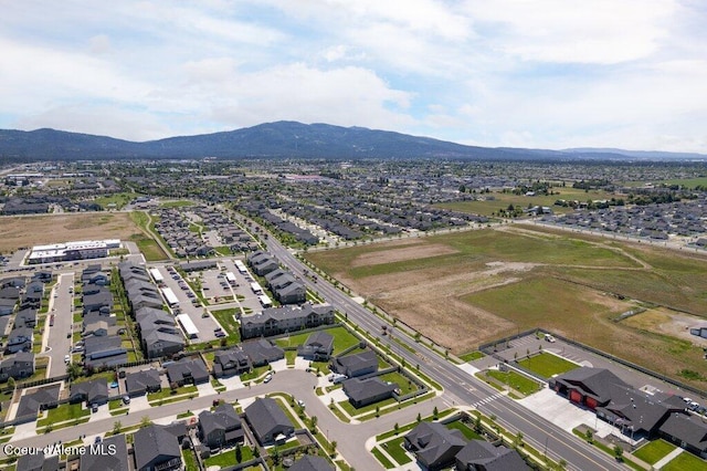 4615 N Connery Loop, Post Falls, ID 83854 - aerial overview of property's location featuring a mountainous background and nearby suburban area