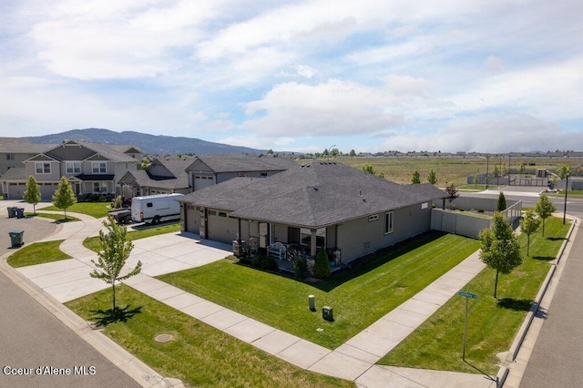4615 N Connery Loop, Post Falls, ID 83854 - aerial view of residential area featuring a mountain backdrop