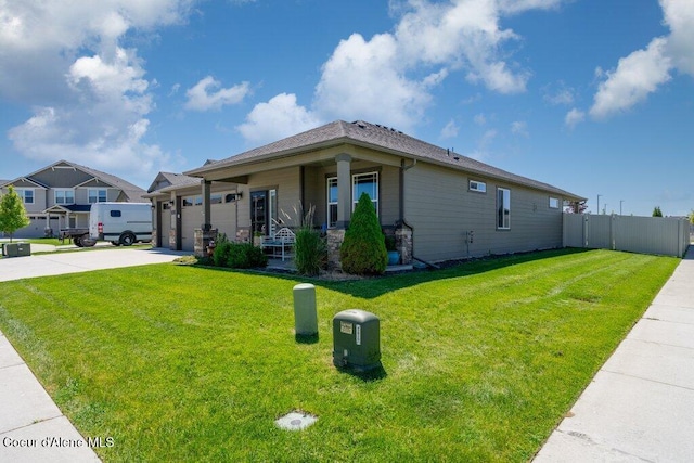 4615 N Connery Loop, Post Falls, ID 83854 - view of property exterior featuring concrete driveway, a porch, and a garage