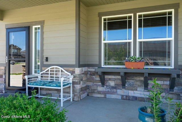 4615 N Connery Loop, Post Falls, ID 83854 - property entrance with a porch