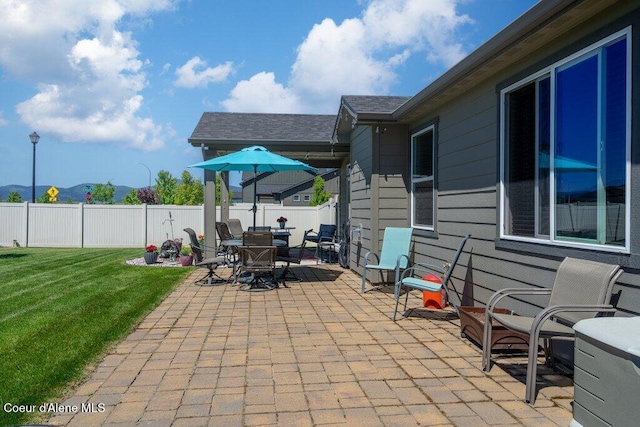 4615 N Connery Loop, Post Falls, ID 83854 - view of patio with outdoor dining space and a mountain view