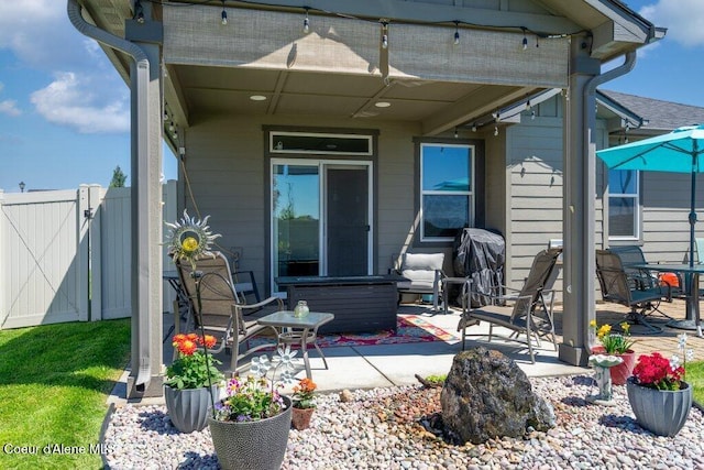 4615 N Connery Loop, Post Falls, ID 83854 - rear view of property with a patio and a gate